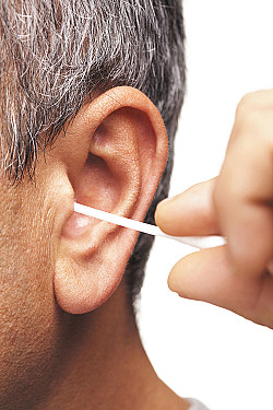 Clean your ears every 1-2 days with a specialist ear cleaning solution. To make your own solution, mix 1 drop of baby oil or mineral oil with 8 drops of white vinegar or rubbing alcohol.