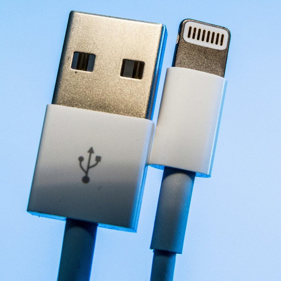 Plug one end of the USB cable into your iPhone
Plug the other end of the USB cable into a USB port on your computer